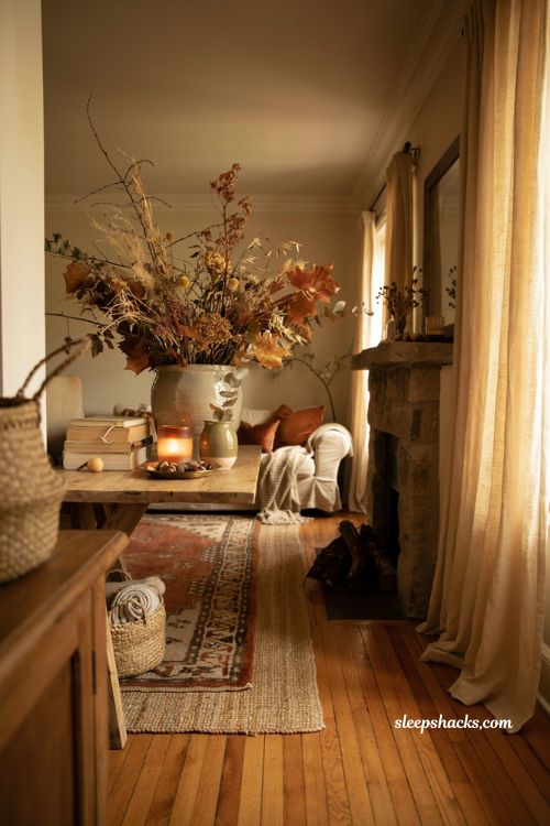 Foraged fall decor ideas with natural branches leaves and cozy home styling