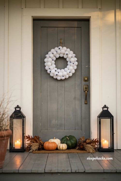 Googly eyed Halloween wreath with playful ping pong ball front door decor