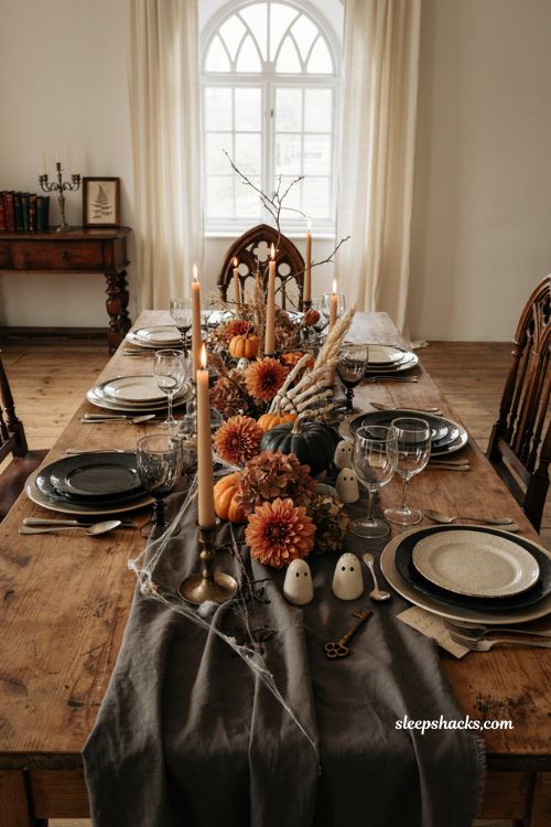 Halloween dining table decor with skeleton hand ghost shakers and unexpected gothic details