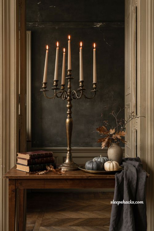 Halloween entryway decor with antique candelabra and flameless candles