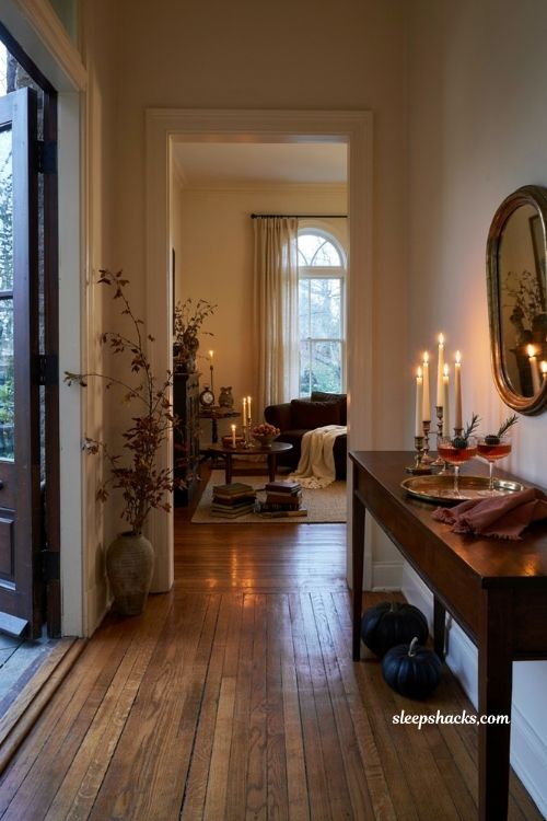 Halloween house party ideas for adults with elegant candlelit decor