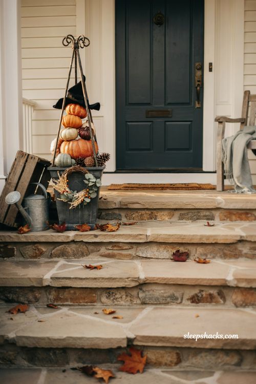Halloween pumpkin obelisk tower for easy low maintenance fall porch decor