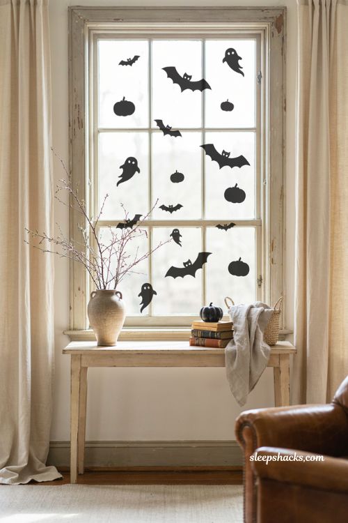 Halloween window clings with bats ghosts and pumpkins for cheap decor 