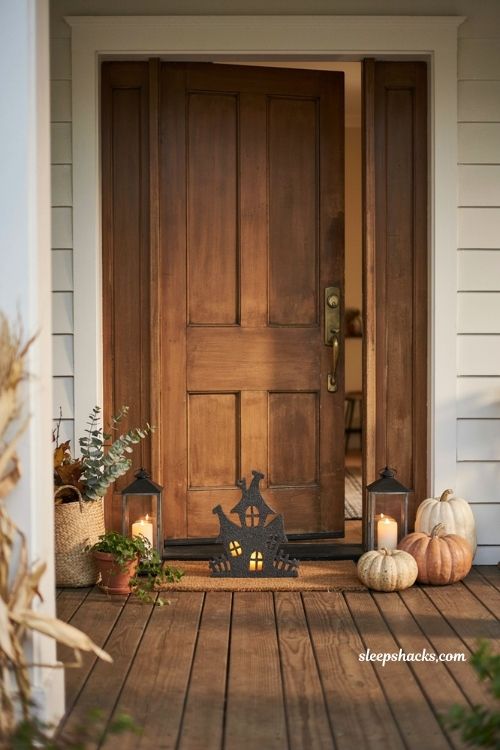 Haunted house illuminated Halloween doormat with elegant fall front door decor
