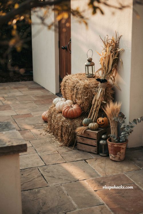 Hay bale and cornstalk corner for patio halloween decorating