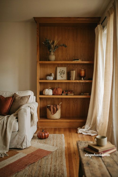 Knit and woven pumpkin shelf decor ideas for a cozy fall living room