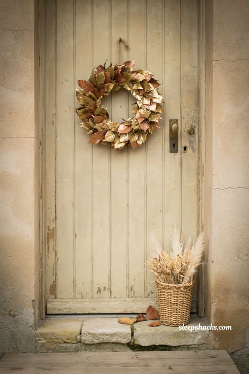 Metallic painted fall leaf wreath with gold and copper leaves