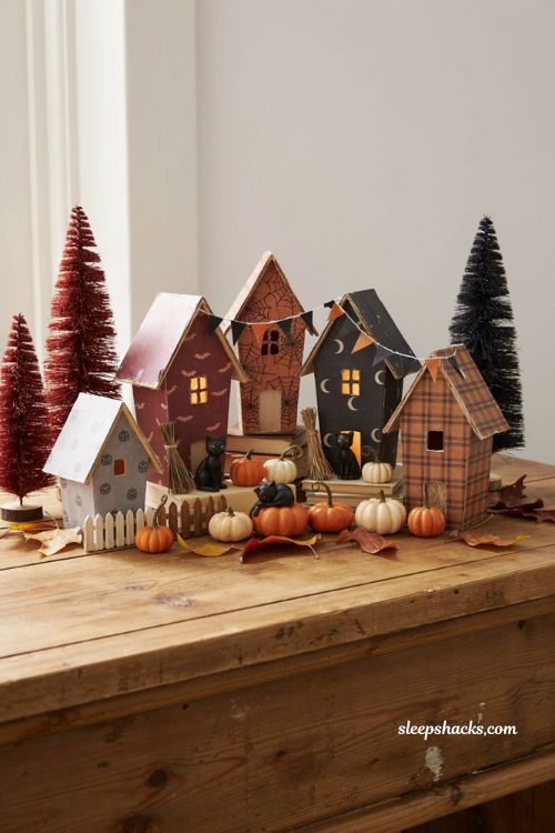 Mod Podge scrapbook paper Halloween village with handmade haunted birdhouses 