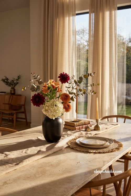 Modern fall decor ideas with harvest flowers in a minimalist black vase
