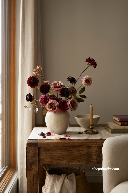 Modern fall decor with burgundy plum and wine floral accents 