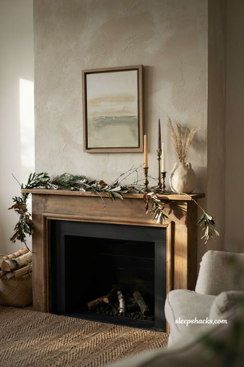 Modern fall decor with minimalist mantel garland candles and dried florals 