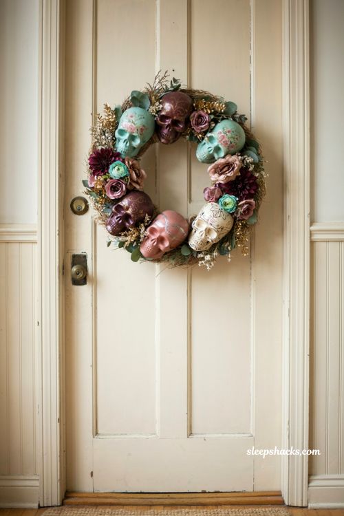 Painted metallic skull cluster wreath with colorful sugar skulls faux flowers gold silver Halloween decor