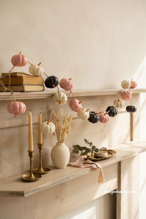 Painted mini pumpkin garland in dusty pink cream and black