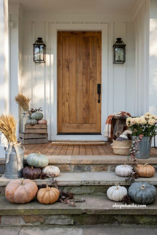 Painted pumpkin front porch decor ideas with custom fall colors and farmhouse style