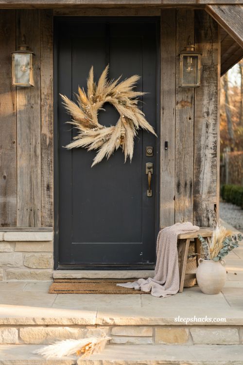 Pampas grass wreath ideas for a cozy fall front door with elegant neutral decor