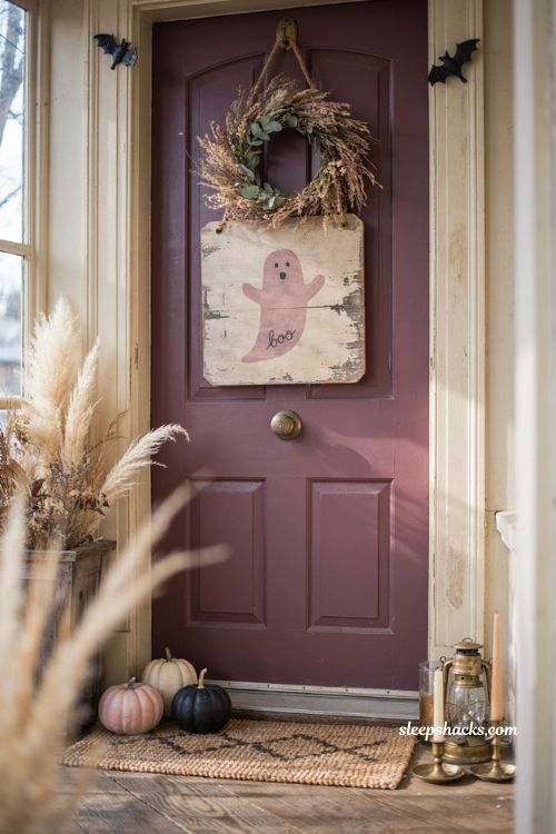 Pink ghost door sign for a cozy farmhouse Halloween front porch