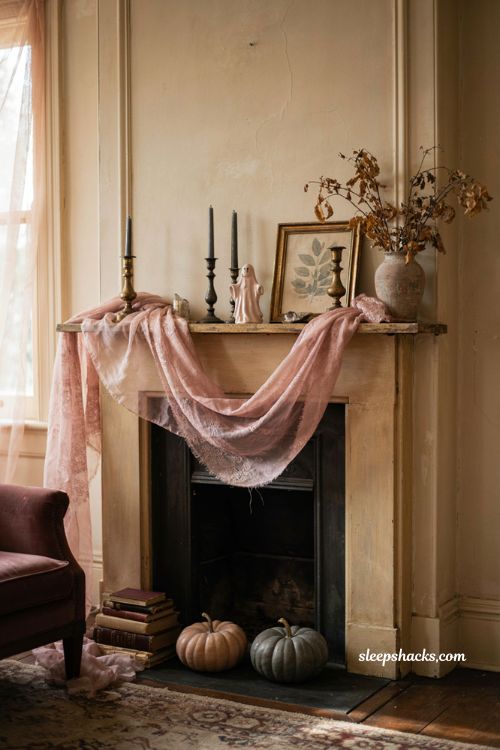 Pink mantel scarf with black candlesticks for cozy Halloween fireplace decor