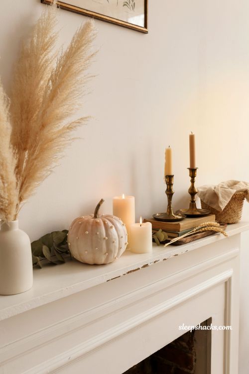 Pink pumpkin fall decor with pearl embellished white pumpkin mantel styling