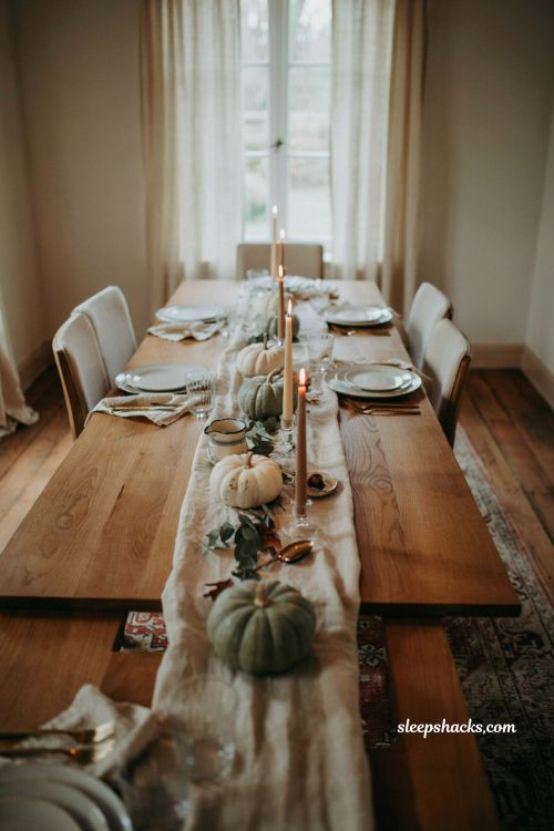 Pumpkin baby shower centerpiece with cream pumpkins sage pumpkins and candles
