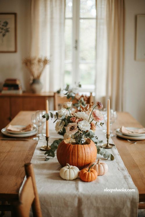 Pumpkin baby shower centerpiece with diy pumpkin vase and pink flowers