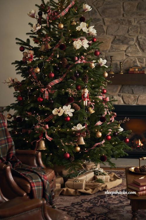 Ralph Lauren Christmas tree with aged brass bells tartan ribbon and vintage ornaments 