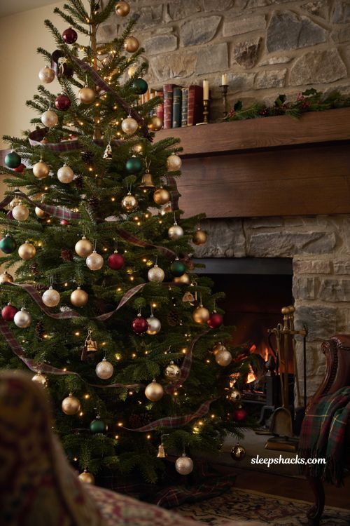 Ralph Lauren Christmas tree with balanced gold and silver ornaments and tartan ribbon 