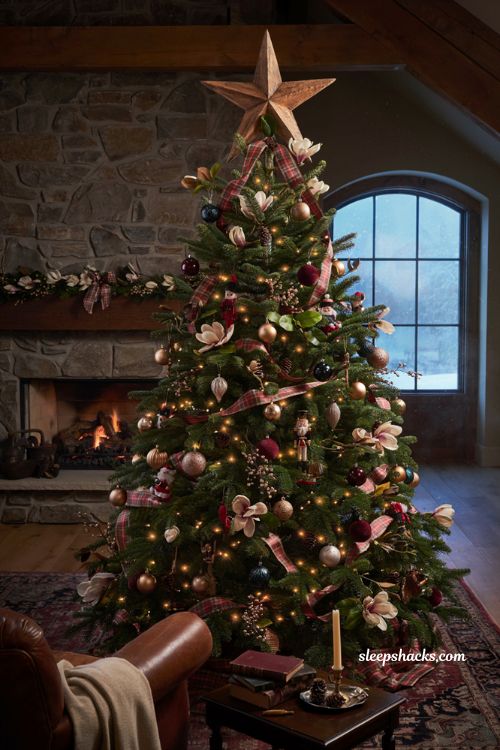 Ralph Lauren Christmas tree with carved wooden star topper and tartan ribbon 