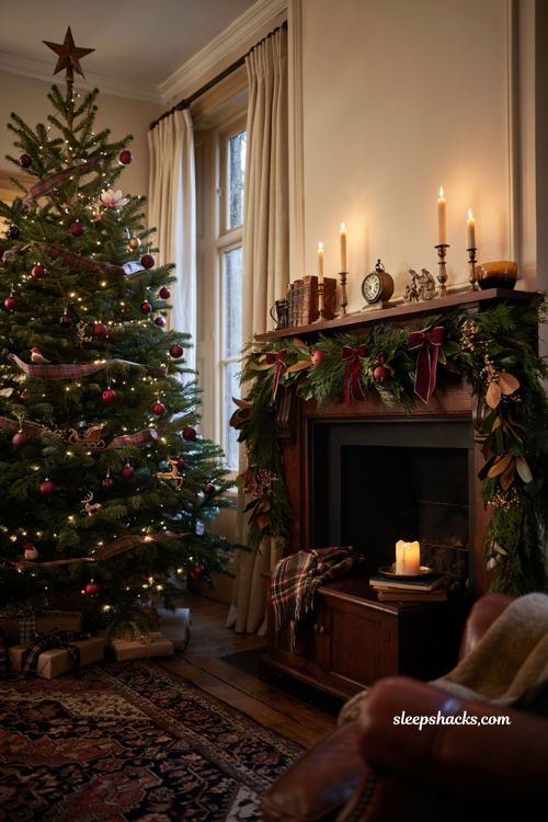 Ralph Lauren Christmas tree with full mantel garland magnolia pomegranates and velvet bows