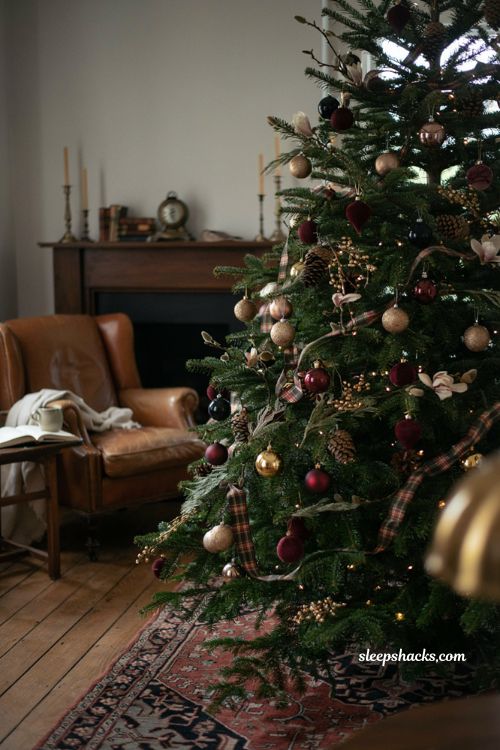Ralph Lauren Christmas tree with pinecones tartan ribbon velvet ornaments and natural textures 