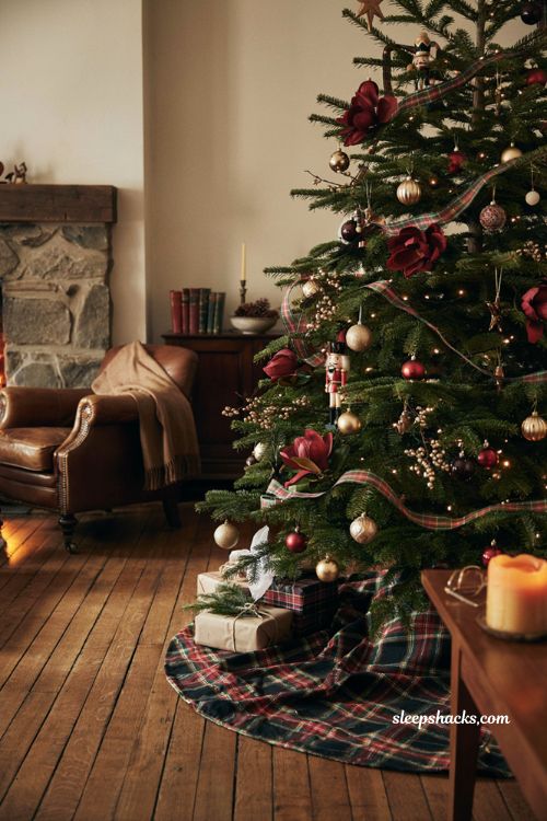 Ralph Lauren Christmas tree with reversible tartan tree skirt and cozy lodge decor 
