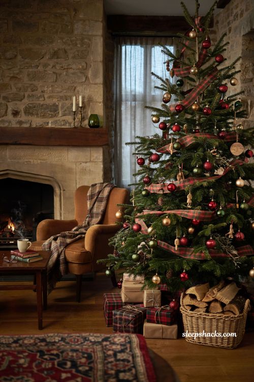 Ralph Lauren Christmas tree with tartan ribbon deep red velvet ornaments and cozy lodge decor 
