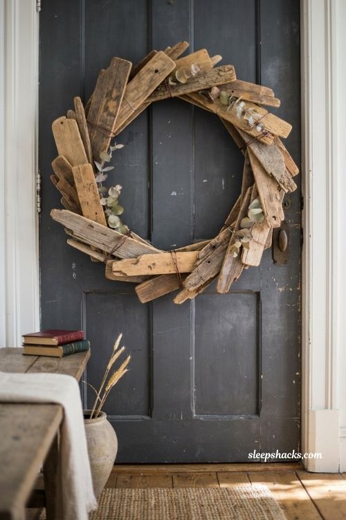 Reclaimed wood slice wreath with dried greenery for vintage fall decor