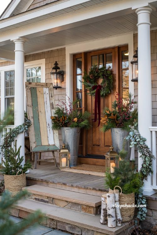 Rustic Christmas front porch with handmade wood sign and farmhouse holiday decor