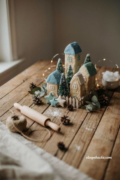 Salt dough gingerbread Christmas village with icy blue and seafoam green rooftops handmade winter decor