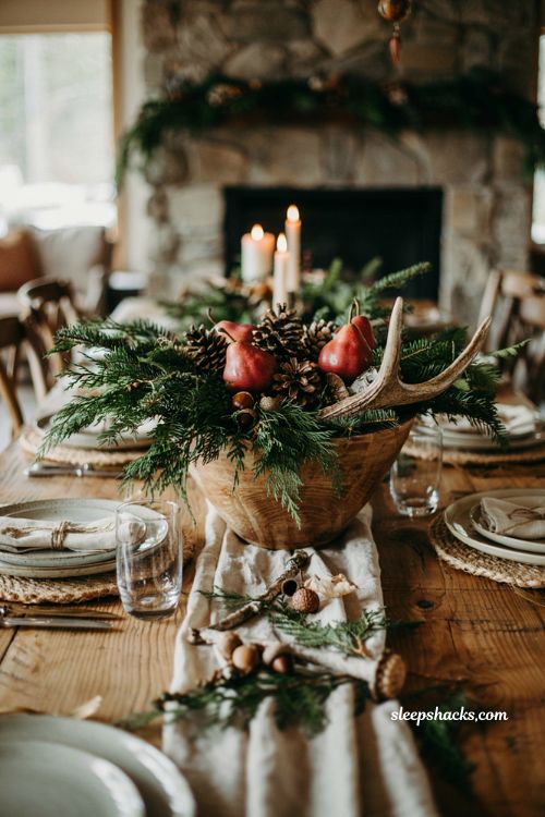 Simple christmas centerpieces for table with pinecones antlers and woodland holiday bowl