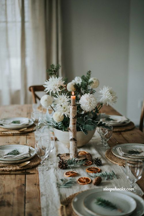 Simple christmas centerpieces for table with white chrysanthemum and pine floral arrangement