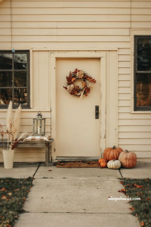 Simple small front porch fall decor with rust and cream color palette