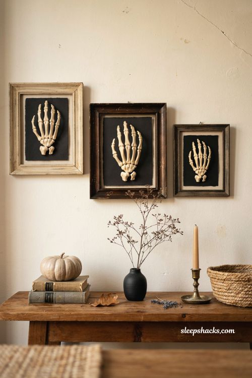 Skeleton hand wall art in black frames for farmhouse Dollar Tree Halloween decor