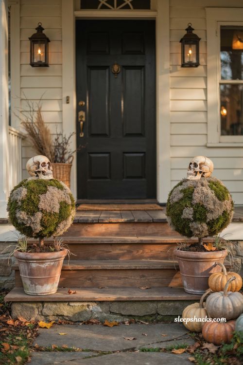 Skull topiary planters for elegant cozy DIY Halloween front porch decor