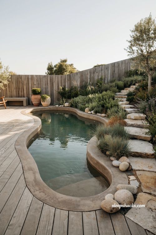 Small natural pool with a custom concrete shell design for narrow backyards