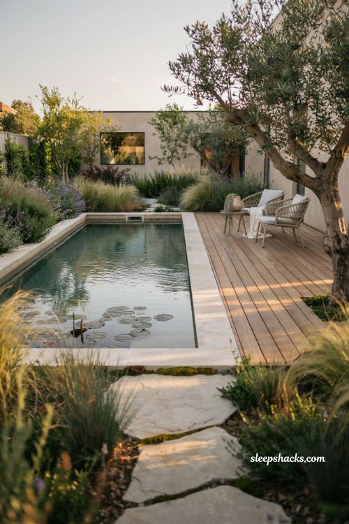 Small natural pool with a perfectly proportioned backyard garden design