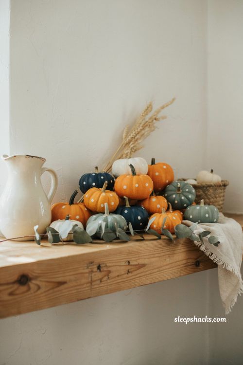 Small pumpkin decorating ideas with hand painted polka dot mini pumpkins for cozy farmhouse fall decor