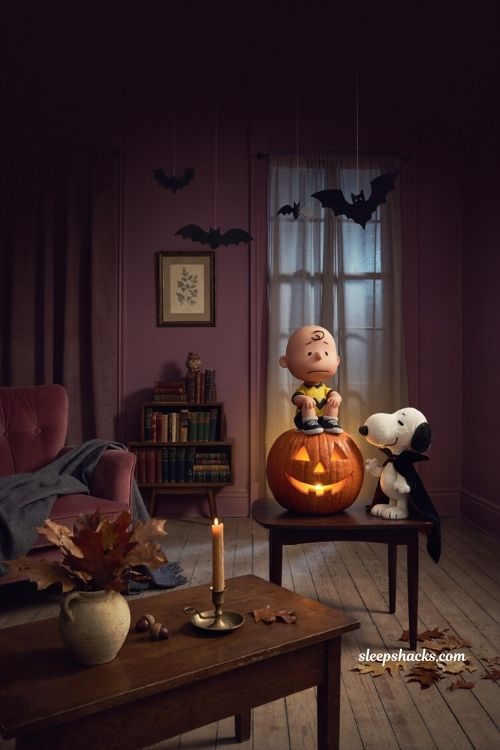 Snoopy vampire Halloween with Charlie Brown glowing jack o lantern bats spooky fall wallpaper 