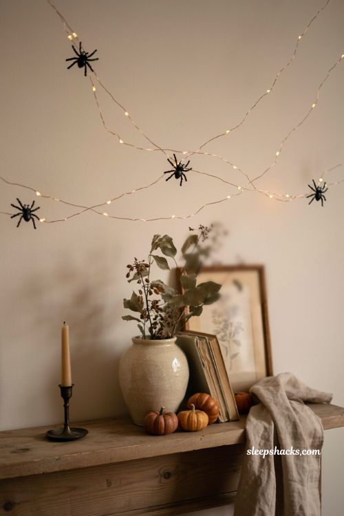 Spider fairy lights with googly eyes for cozy Halloween decor