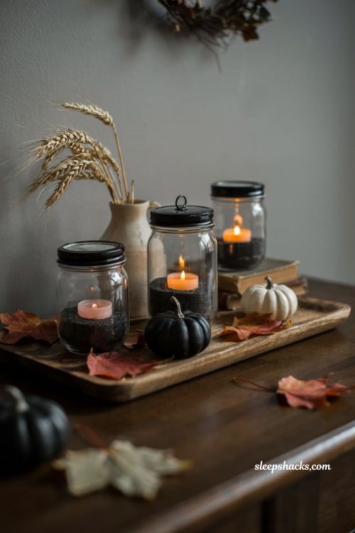 Spooky black sand mason jar lantern with cozy Halloween fall decor