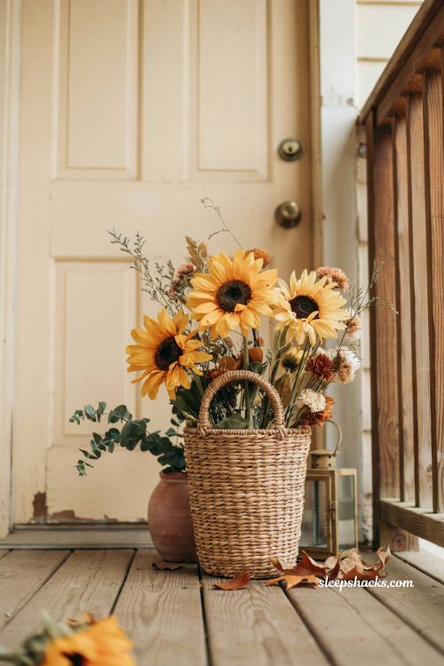 Sunflower and wildflower fall basket with warm gold rust and autumn porch decor
