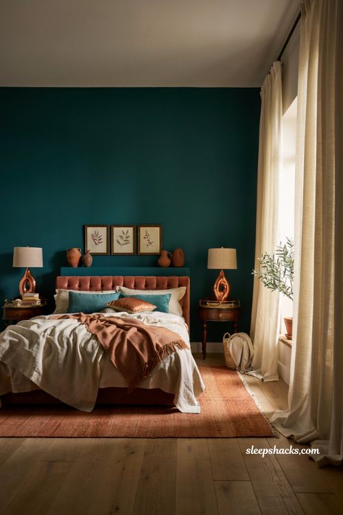 Teal and copper bedroom with terracotta rug and warm earthy accents