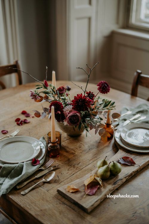 Thanksgiving flower arrangement ideas with burgundy flowers and sage greenery 