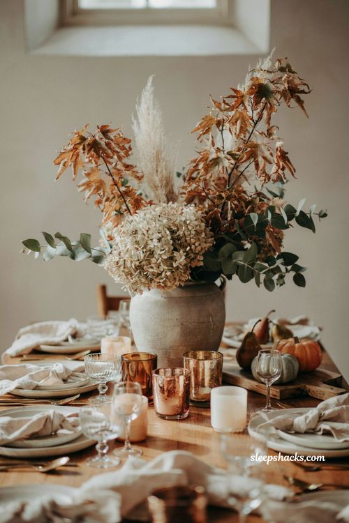 Thanksgiving flower arrangement ideas with hydrangea grasses and eucalyptus 