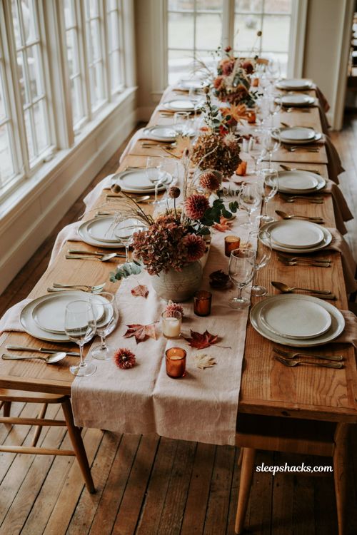 Thanksgiving flower arrangement ideas with long low table centerpiece 